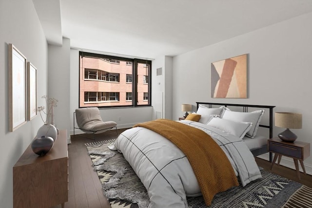 1 Charles St S Unit 604, Boston, MA 02116 - bedroom featuring wood-type flooring and baseboards