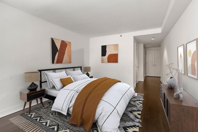 1 Charles St S Unit 604, Boston, MA 02116 - bedroom featuring dark wood-type flooring and baseboards