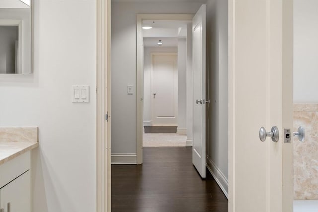 1 Charles St S Unit 604, Boston, MA 02116 - hall featuring dark wood-style floors and baseboards