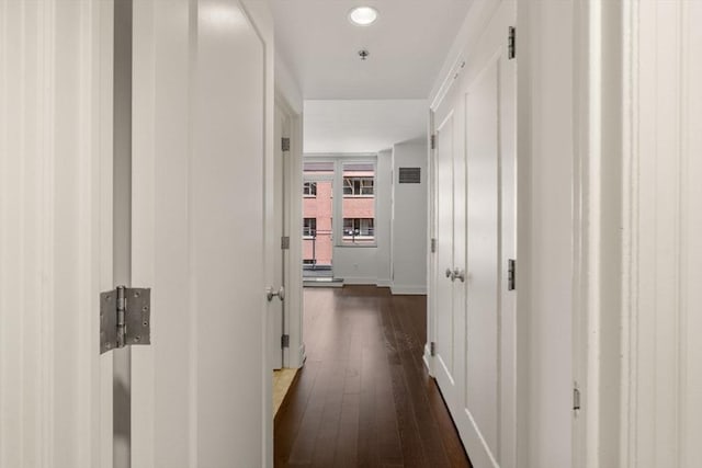 1 Charles St S Unit 604, Boston, MA 02116 - hall featuring dark wood-style flooring, baseboards, and recessed lighting