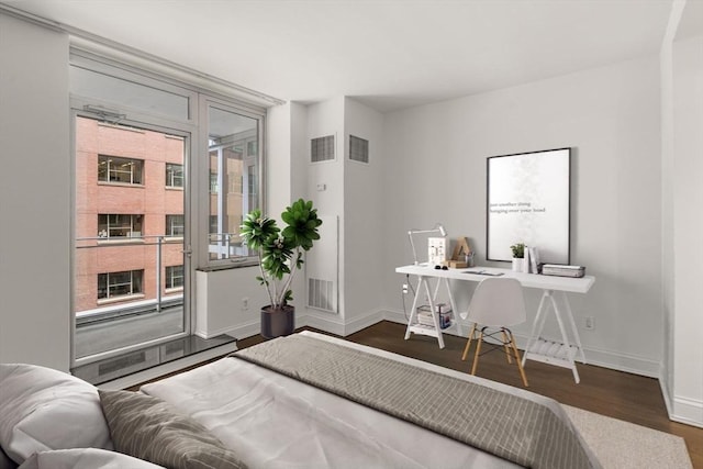 1 Charles St S Unit 604, Boston, MA 02116 - bedroom featuring access to outside, wood finished floors, baseboards, and an office area