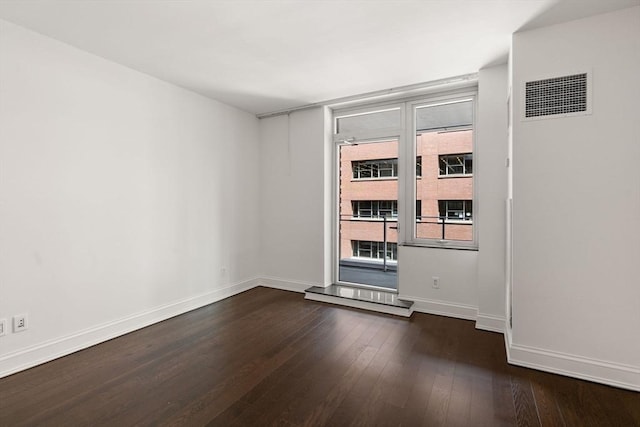 1 Charles St S Unit 604, Boston, MA 02116 - empty room featuring dark wood-style floors and baseboards