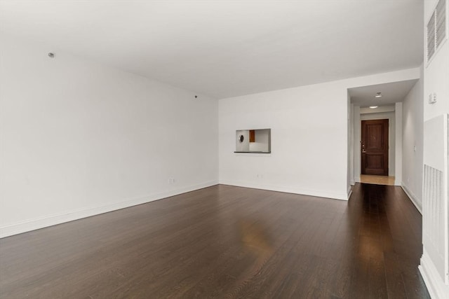 1 Charles St S Unit 604, Boston, MA 02116 - spare room with dark wood finished floors and baseboards
