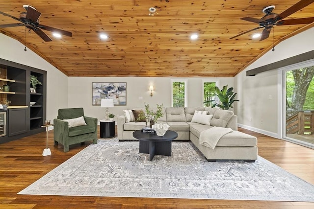 616 Grove St, Framingham, MA 01701 - living area featuring vaulted ceiling, a ceiling fan, wood ceiling, wood finished floors, and plenty of natural light
