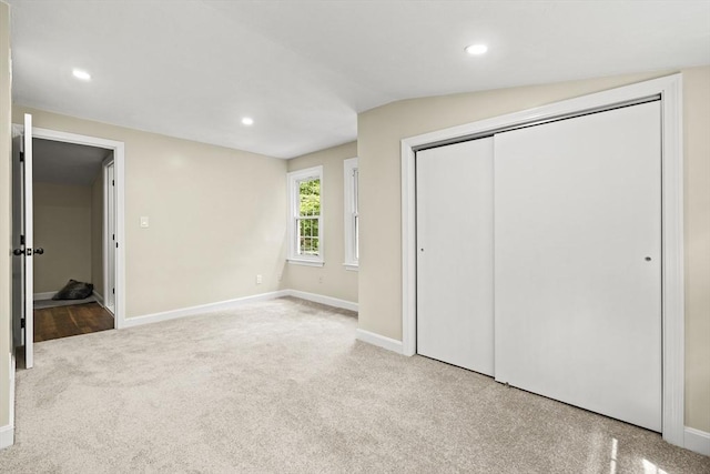 616 Grove St, Framingham, MA 01701 - unfurnished bedroom with carpet, a closet, recessed lighting, and lofted ceiling