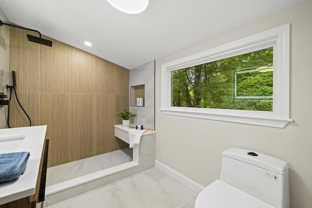 616 Grove St, Framingham, MA 01701 - bathroom with marble finish flooring, a shower, and vanity