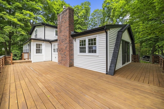 616 Grove St, Framingham, MA 01701 - wooden terrace featuring view of wooded area