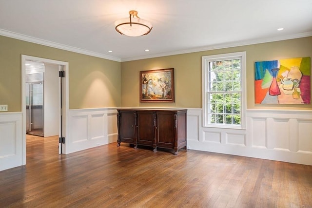 10 Queen Anne Rd, Hopkinton, MA 01748 - empty room featuring ornamental molding, recessed lighting, and wood finished floors