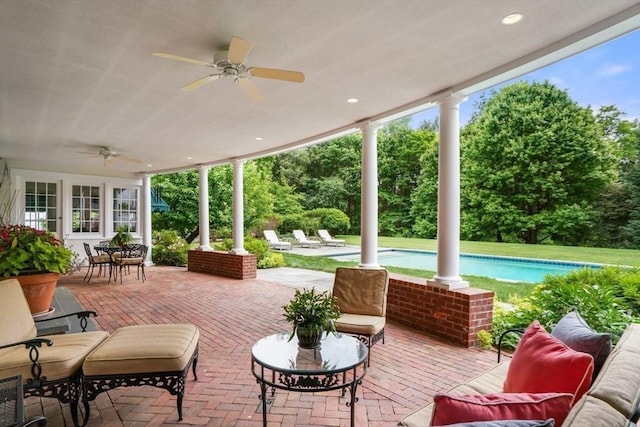 10 Queen Anne Rd, Hopkinton, MA 01748 - view of patio / terrace featuring an outdoor pool, an outdoor living space, and a ceiling fan