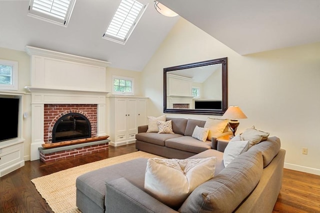 10 Queen Anne Rd, Hopkinton, MA 01748 - living area featuring dark wood-style floors, a brick fireplace, lofted ceiling, and baseboards