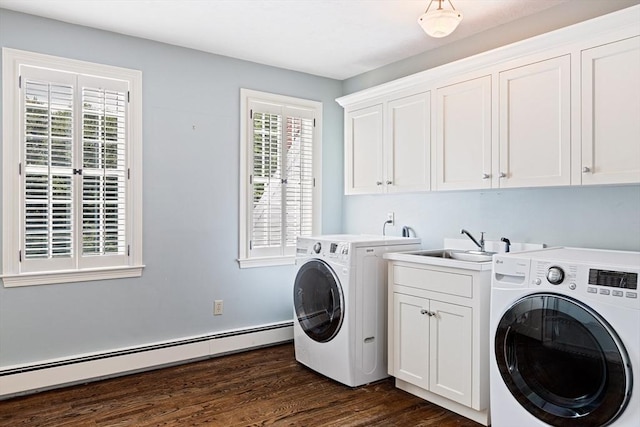 10 Queen Anne Rd, Hopkinton, MA 01748 - washroom with a baseboard heating unit, dark wood-style flooring, a sink, cabinet space, and washing machine and clothes dryer