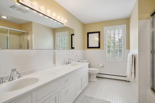 10 Queen Anne Rd, Hopkinton, MA 01748 - bathroom with a shower with door, tile walls, baseboard heating, a sink, and tile patterned flooring