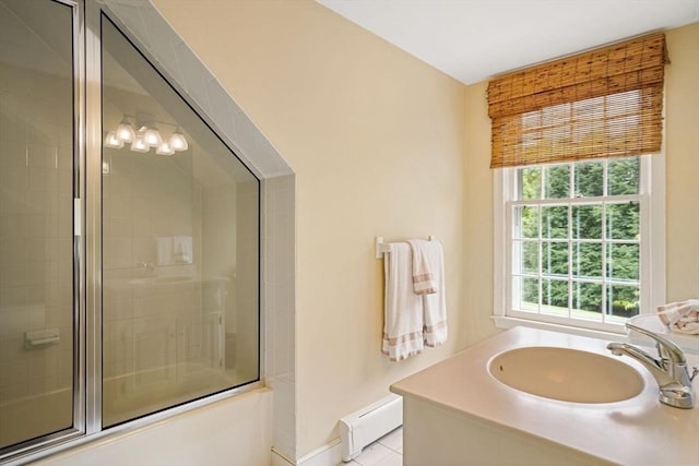 10 Queen Anne Rd, Hopkinton, MA 01748 - bathroom featuring a healthy amount of sunlight, a sink, baseboard heating, and bath / shower combo with glass door