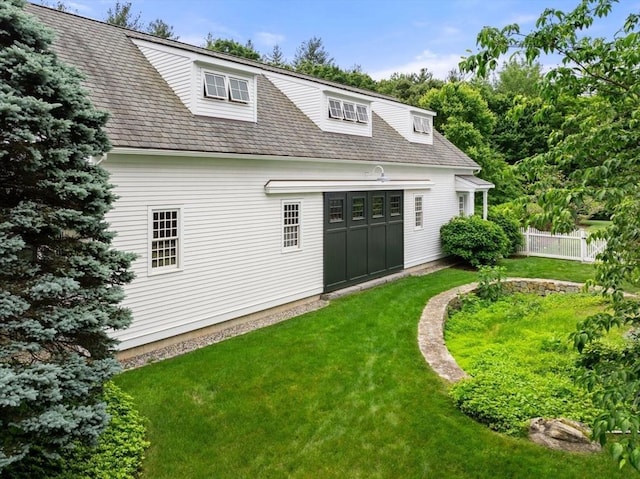 10 Queen Anne Rd, Hopkinton, MA 01748 - back of house with fence and a lawn