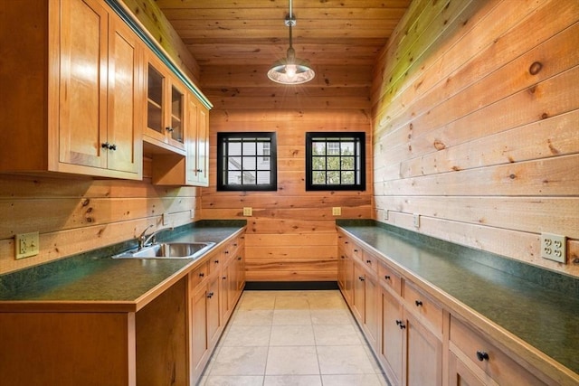 10 Queen Anne Rd, Hopkinton, MA 01748 - kitchen featuring dark countertops, wooden ceiling, a sink, and light tile patterned floors