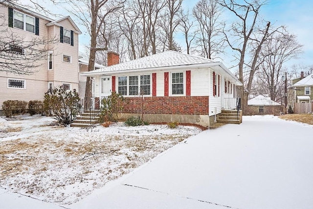 view of front of property with a chimney