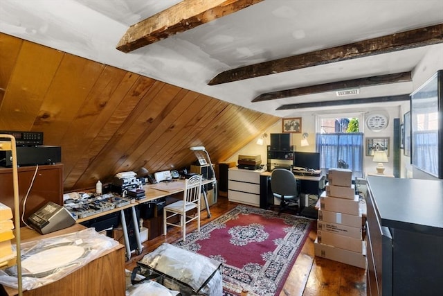 home office with lofted ceiling with beams and hardwood / wood-style flooring
