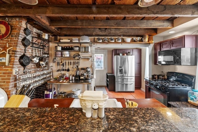 kitchen featuring wood ceiling, black appliances, beam ceiling, and light wood-style floors