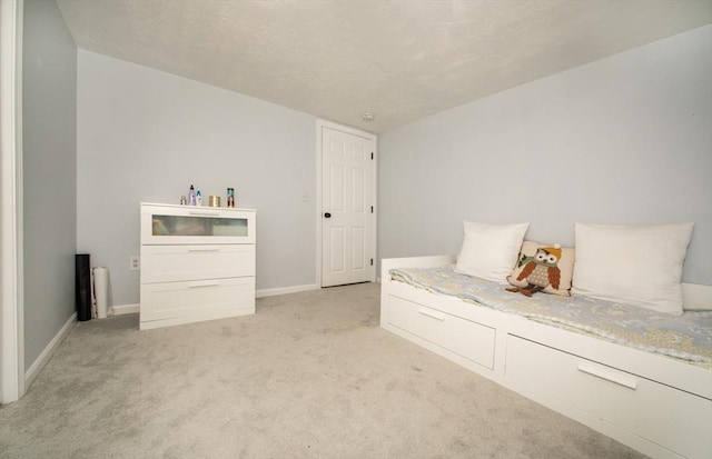 unfurnished room with light colored carpet