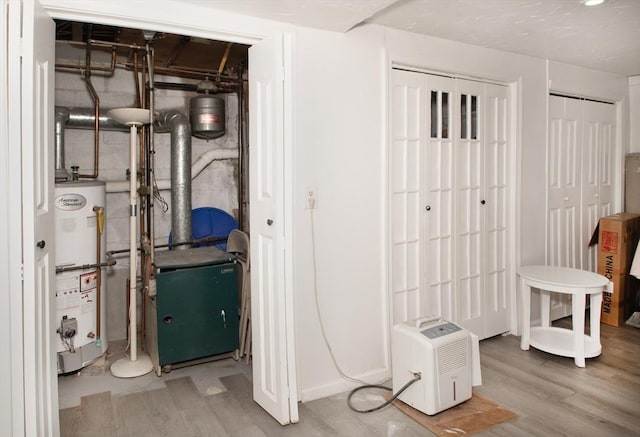 utility room with water heater