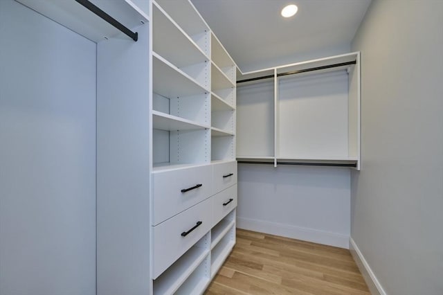 walk in closet featuring light wood-type flooring