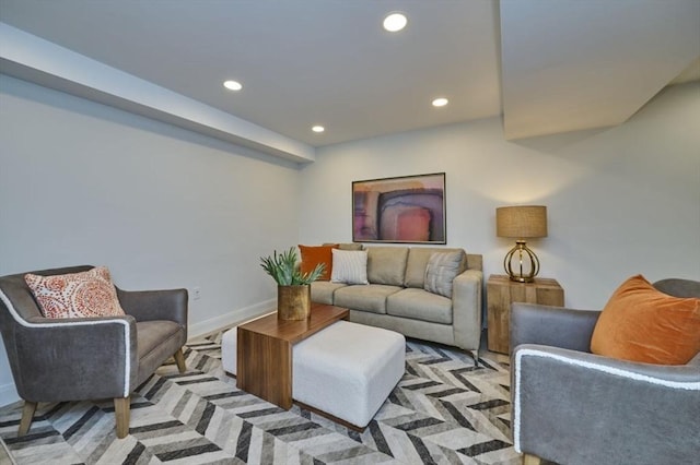 living area with recessed lighting and baseboards