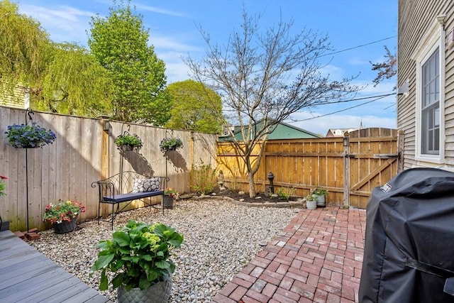 view of patio / terrace featuring a fenced backyard and grilling area