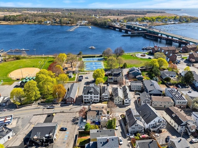 birds eye view of property featuring a water view and a residential view
