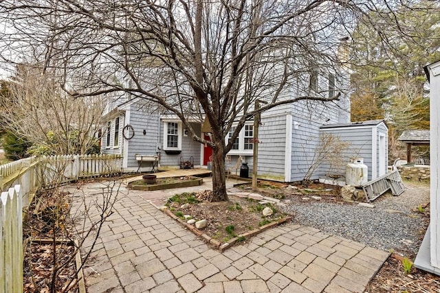 exterior space featuring a patio and fence