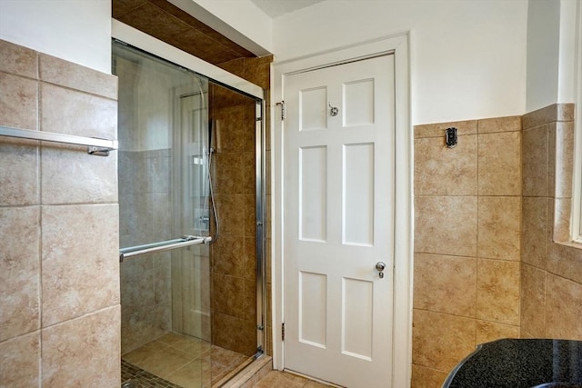 bathroom featuring a stall shower