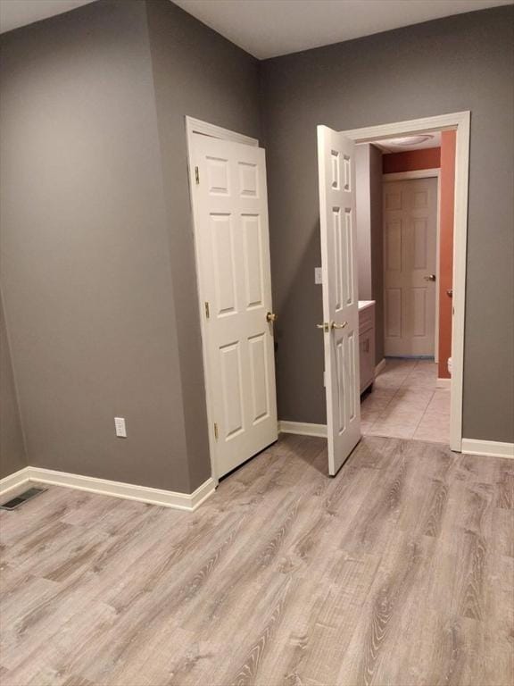 346 Lovell St, Worcester, MA 01602 - empty room with light wood-type flooring and baseboards