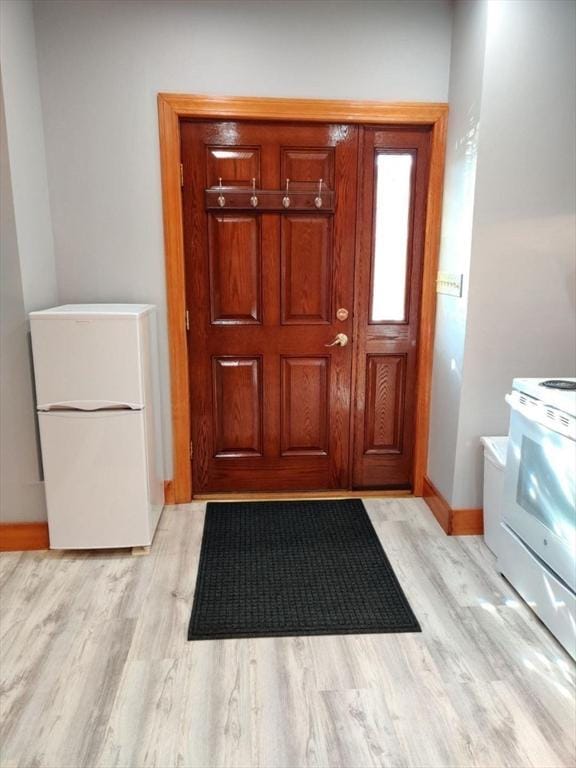 346 Lovell St, Worcester, MA 01602 - entrance foyer featuring light wood-style floors and baseboards