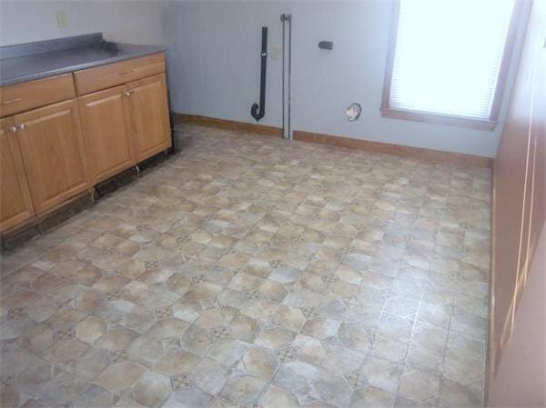 346 Lovell St, Worcester, MA 01602 - kitchen with brown cabinets