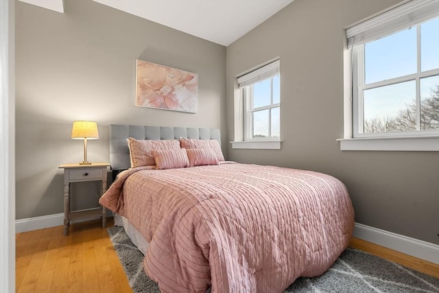 bedroom with light hardwood / wood-style flooring