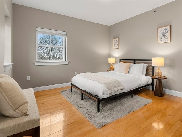 bedroom featuring hardwood / wood-style flooring