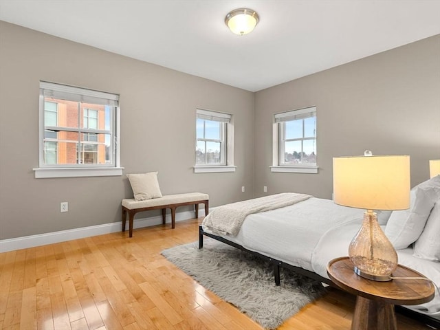 bedroom with light hardwood / wood-style flooring