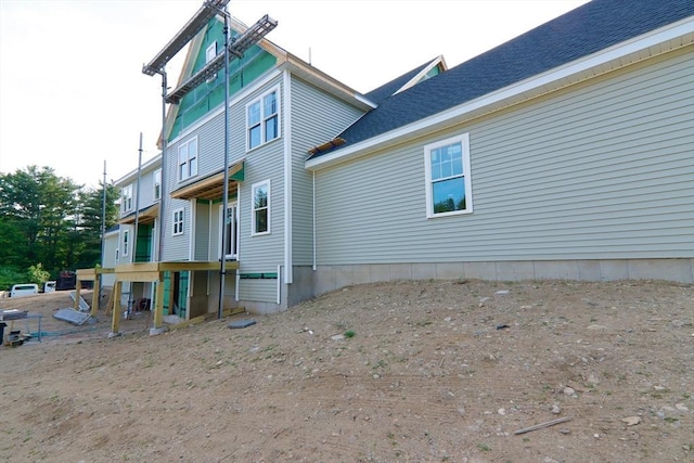 90 Willow St Unit 1, Acton, MA 01720 - rear view of house with a shingled roof