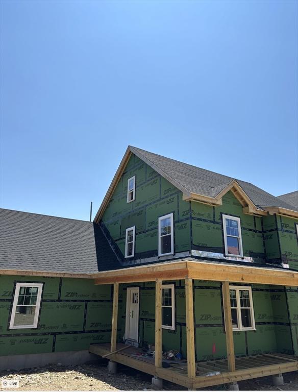 90 Willow St Unit 1, Acton, MA 01720 - view of front of house with a porch and a shingled roof
