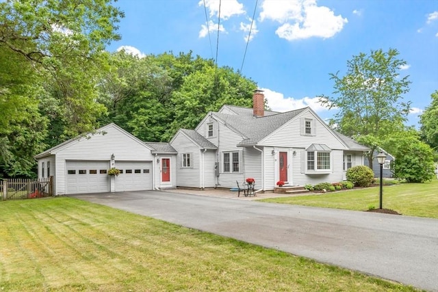 20 Chandler Rd, Andover, MA 01810 - view of front of property featuring a garage, a chimney, driveway, and roof with shingles