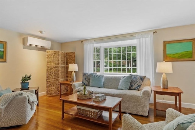 20 Chandler Rd, Andover, MA 01810 - living room with a wall unit AC and wood finished floors