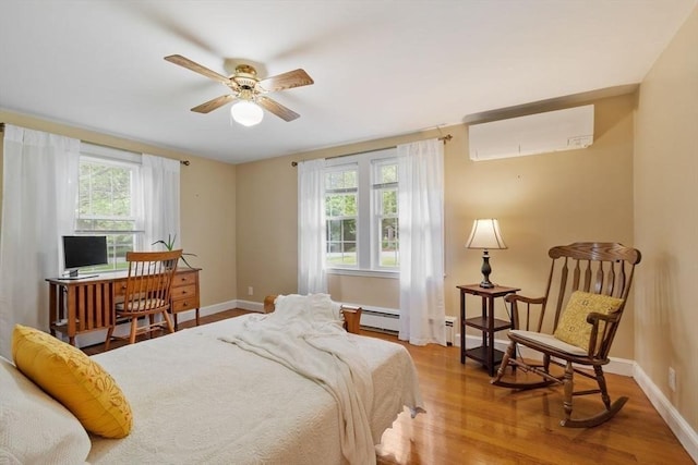 20 Chandler Rd, Andover, MA 01810 - bedroom with a wall mounted AC, wood finished floors, and a ceiling fan