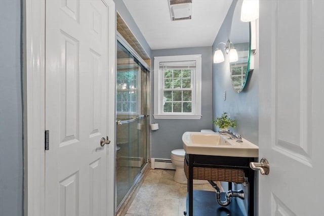 20 Chandler Rd, Andover, MA 01810 - bathroom featuring baseboard heating, a shower stall, and vanity