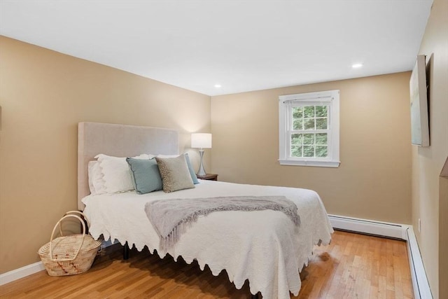 20 Chandler Rd, Andover, MA 01810 - bedroom featuring baseboard heating, light wood-style floors, and recessed lighting