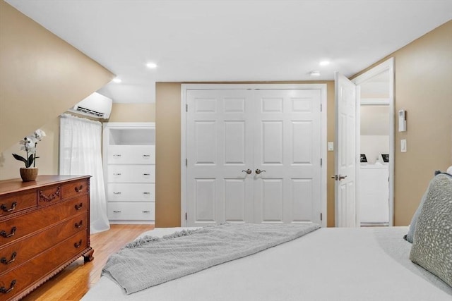 20 Chandler Rd, Andover, MA 01810 - bedroom with a wall mounted AC, light wood-style floors, a closet, and recessed lighting