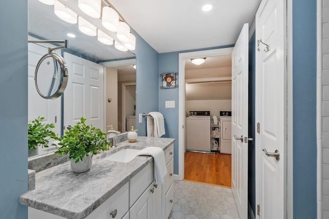 20 Chandler Rd, Andover, MA 01810 - bathroom with washer and clothes dryer, vanity, tile patterned flooring, and recessed lighting