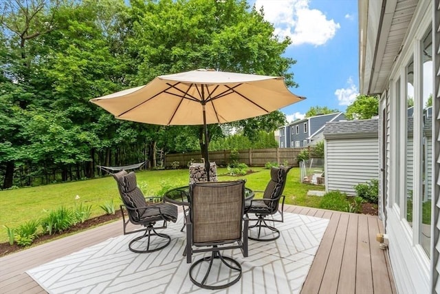 20 Chandler Rd, Andover, MA 01810 - deck with outdoor dining space and a fenced backyard