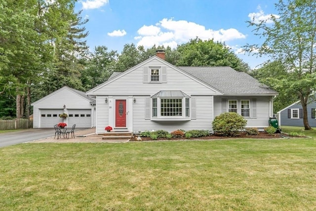 20 Chandler Rd, Andover, MA 01810 - view of front of home featuring a chimney, an outdoor structure, a garage, entry steps, and a front lawn