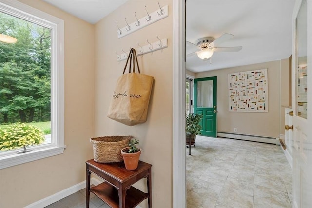 20 Chandler Rd, Andover, MA 01810 - doorway to outside featuring a baseboard heating unit, ceiling fan, and tile patterned flooring