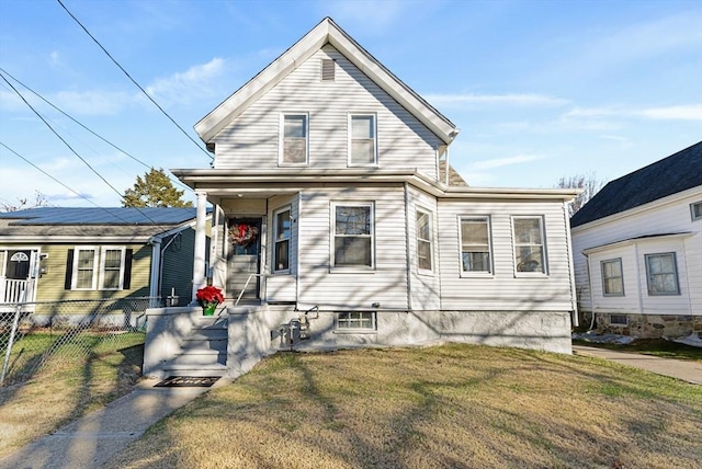 bungalow with a front yard