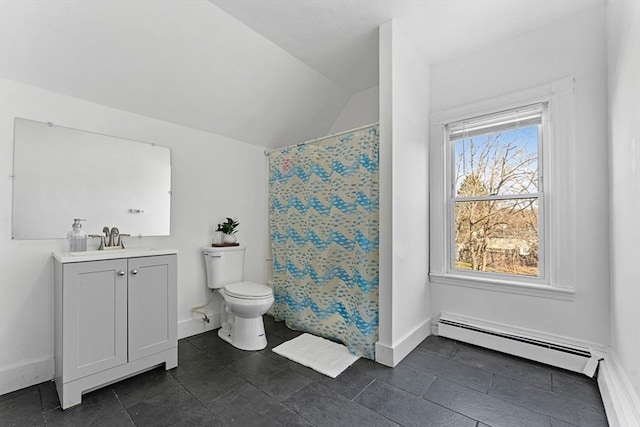 bathroom featuring vanity, a healthy amount of sunlight, toilet, and a baseboard radiator